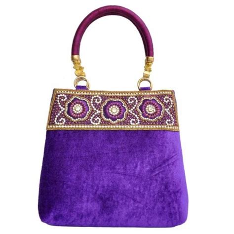 purple luxury designer handbags